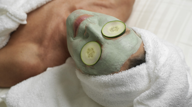 Woman with facial mask on