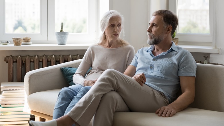 older couple having serious talk