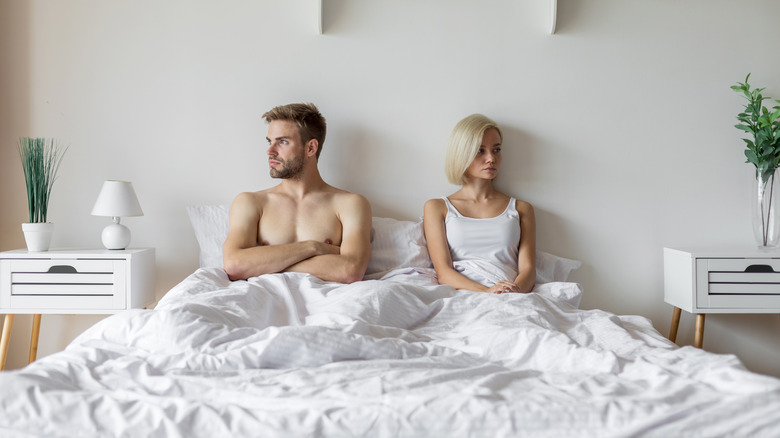 couple angry in bed