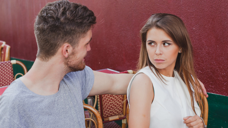 woman annoyed by boyfriend