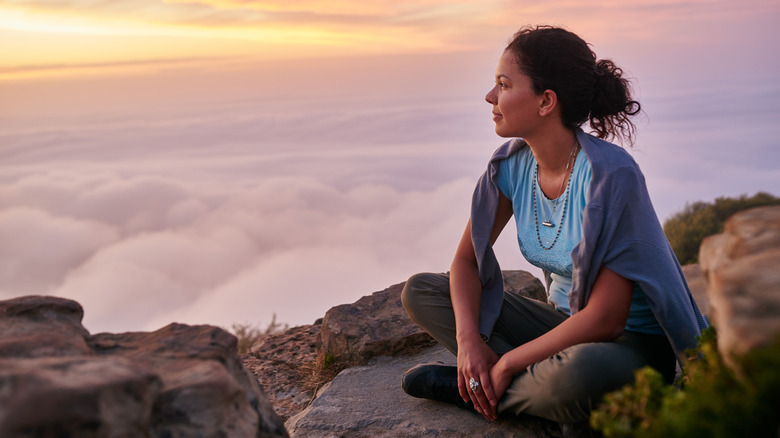 Woman watching clouds