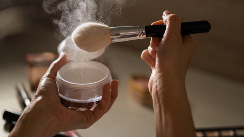 setting powder and makeup brush