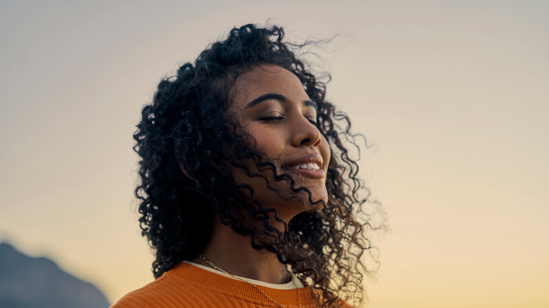 Happy woman with healthy hair