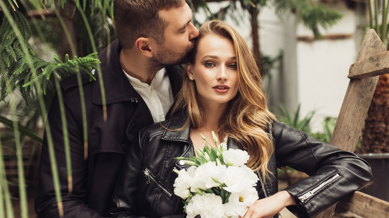 wedding couple wearing black leather jackets