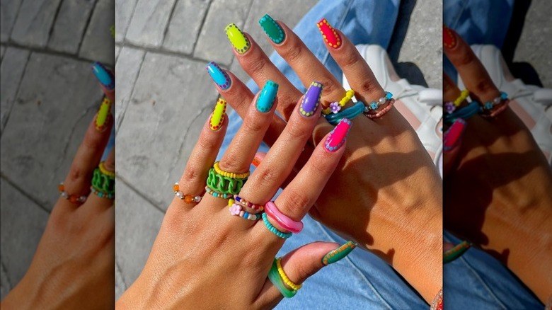 Colorful rings with bright nails