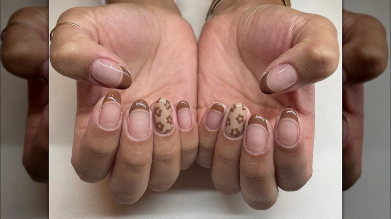 Short rounded tan and taupe floral manicure
