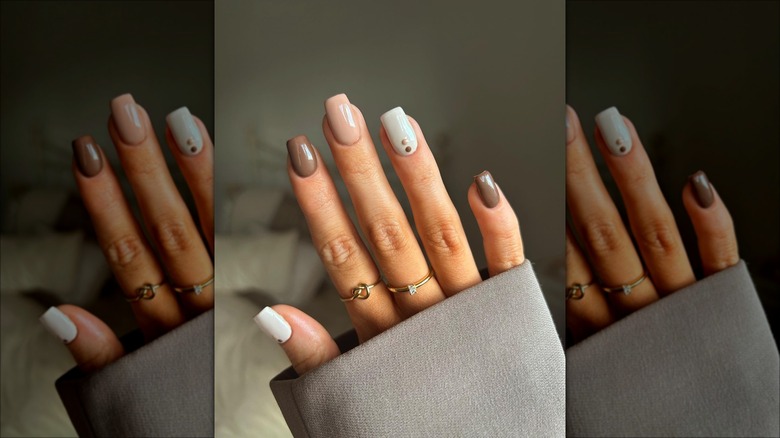 Short square-cut nails with dot design