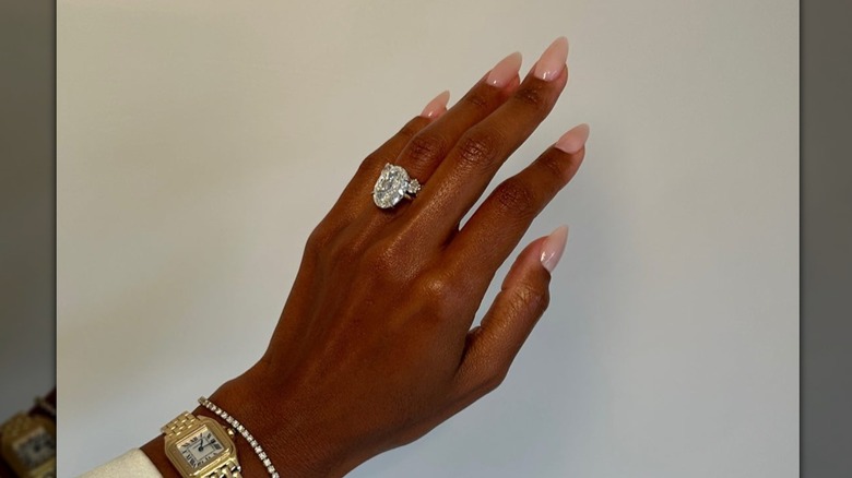 Milky beige nuge stiletto manicure