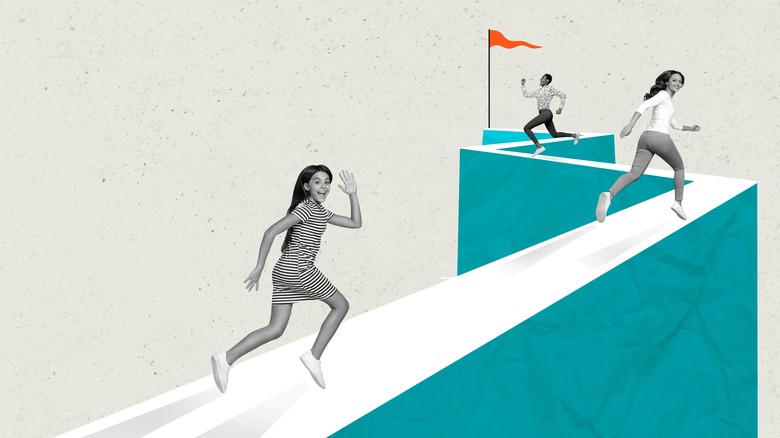 An illustration of three people racing towards the finish line 
