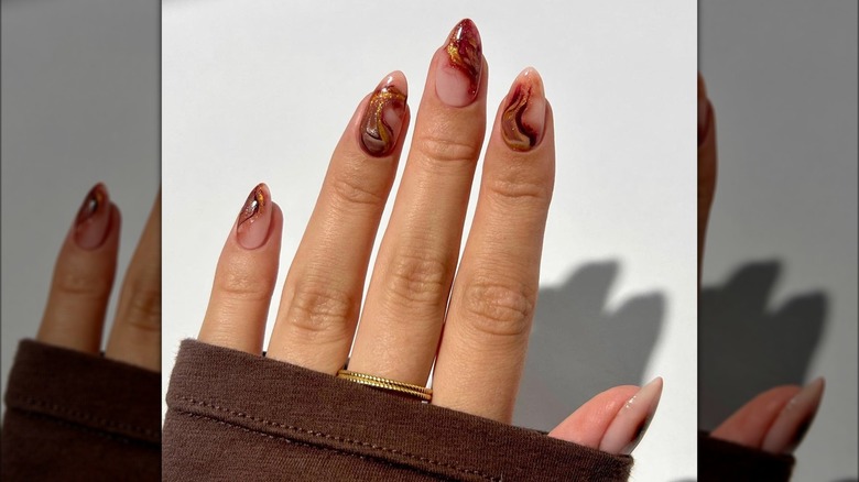 long almond nails with caramel shimmer 