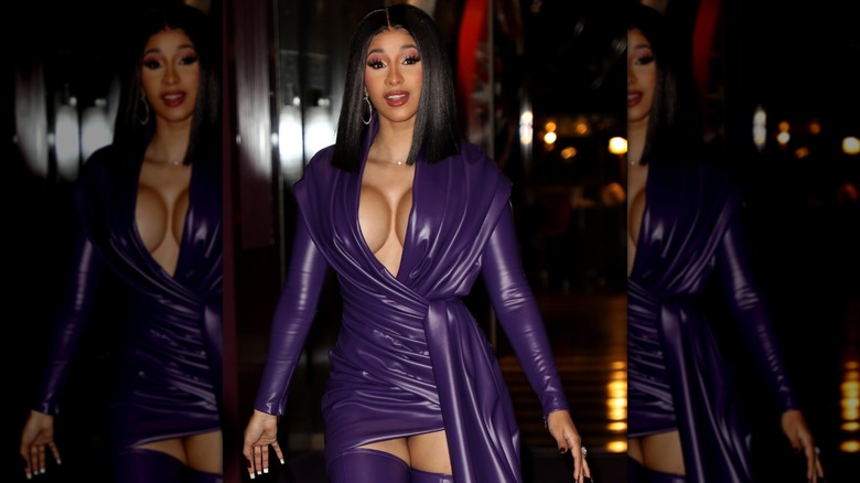 Cardi B in a purple outfit while in Paris