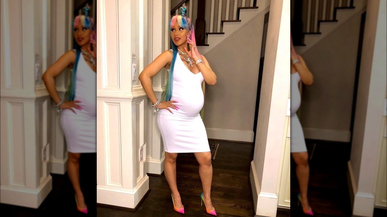 Pregnant Cardi B in white bodycon dress