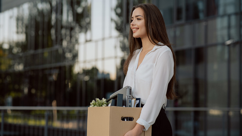 Happy woman leaving job on final day