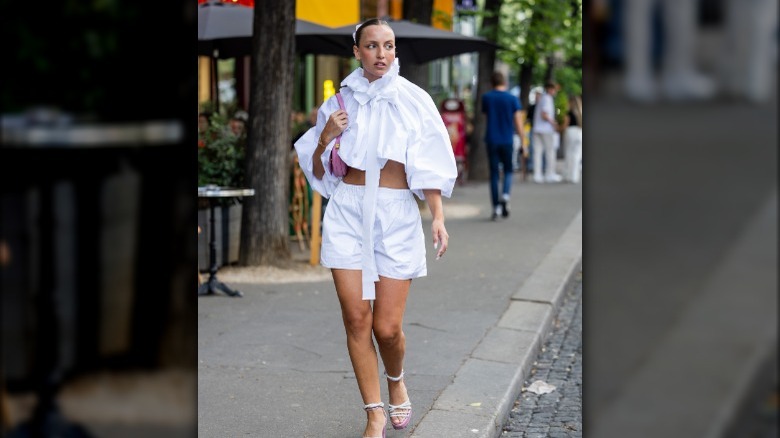 Girl in all-white outfit