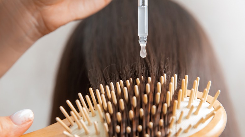 oil dropping on hairbrush