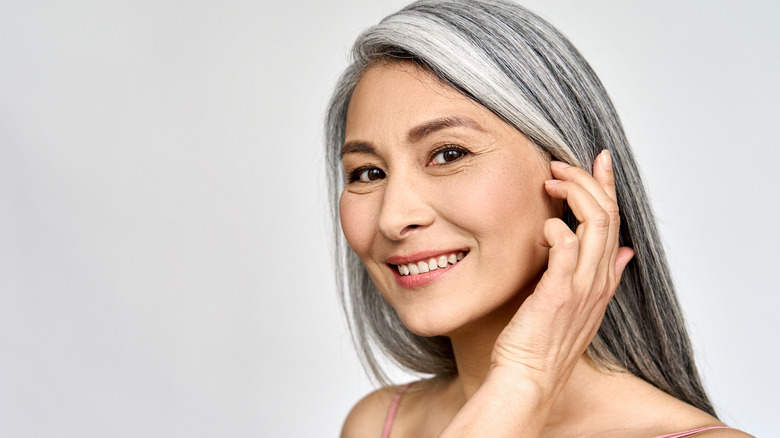 smiling woman with gray hair