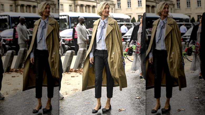 Woman wearing tan trenchcoat