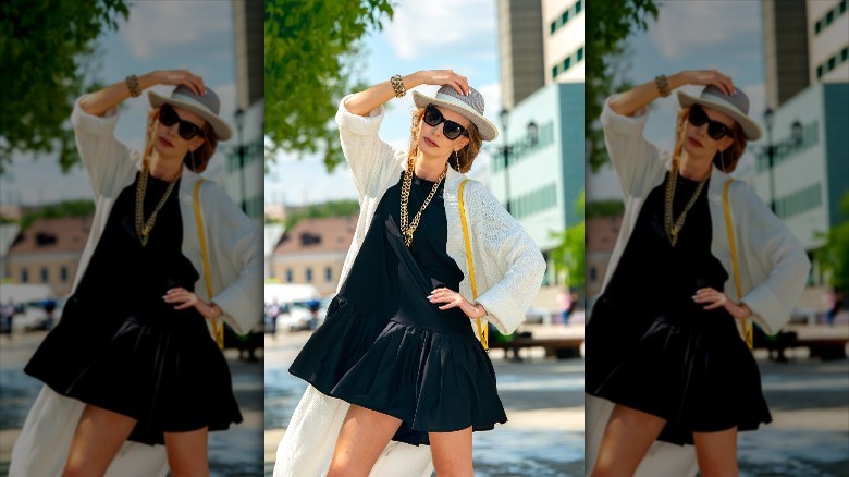 White cardigan over black dress