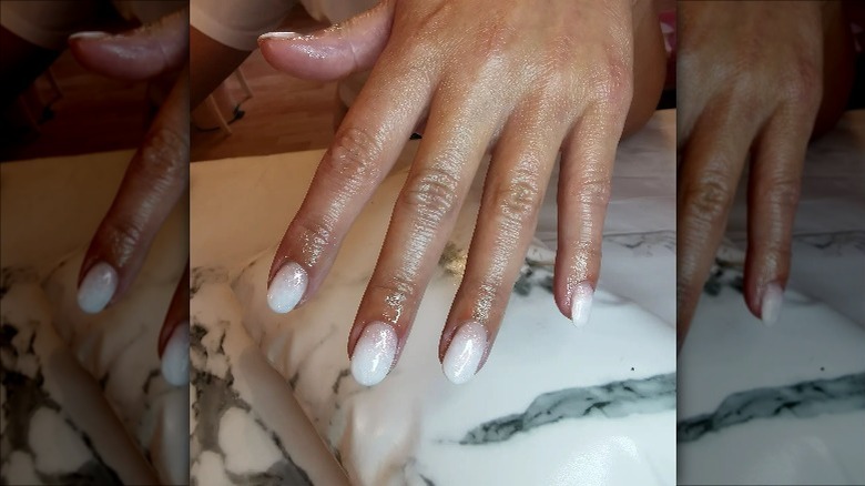 Woman wearing ombré nails