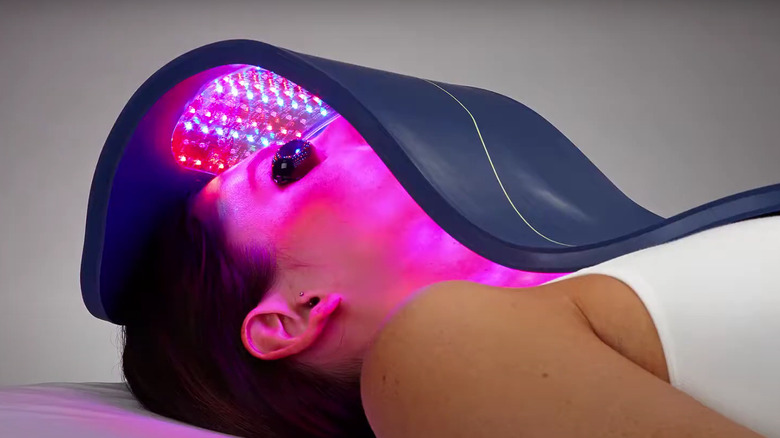 woman using celluma light therapy 