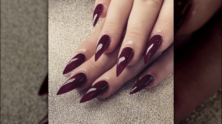 Red pointy nails