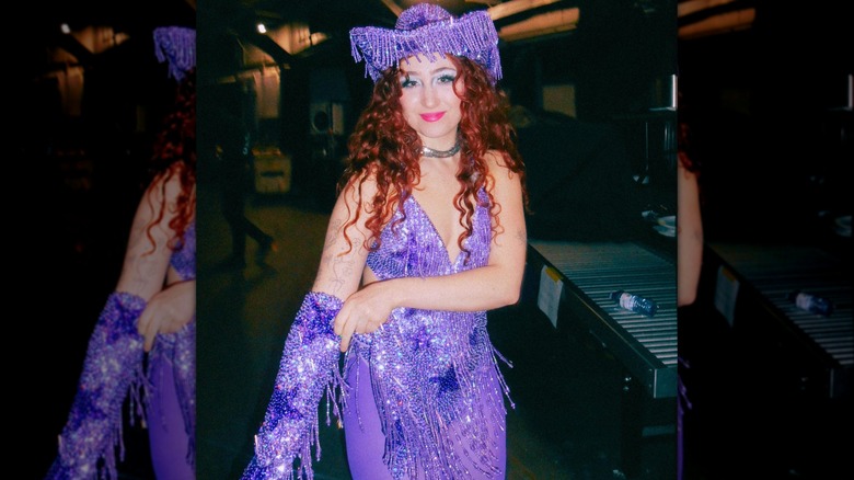 Chappell Roan in a purple rhinestone outfit