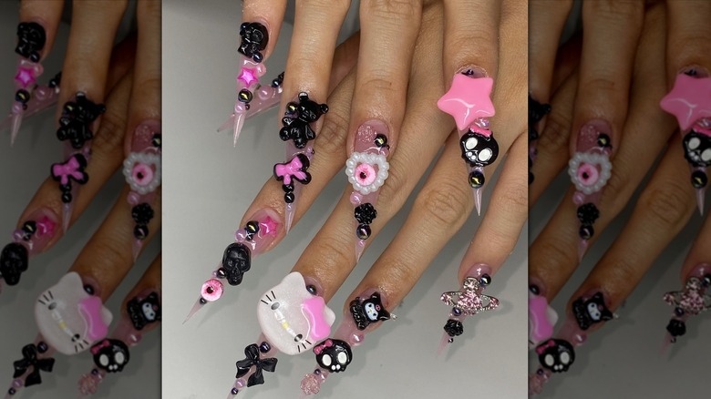 Black and pink nail charms