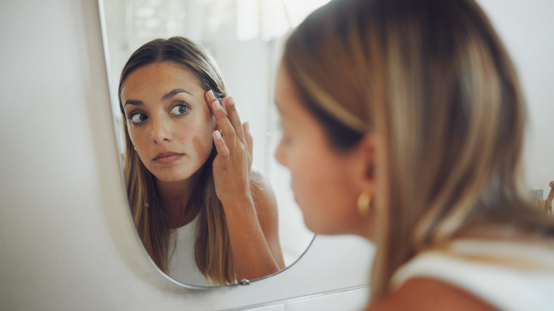 woman looking at cheeks