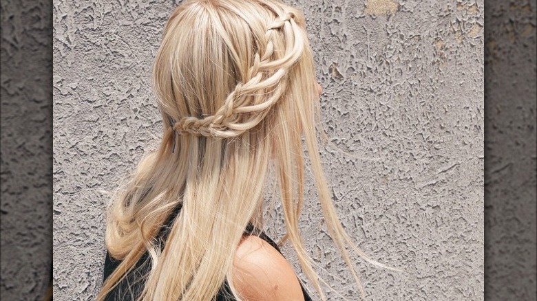 A woman with a waterfall braid