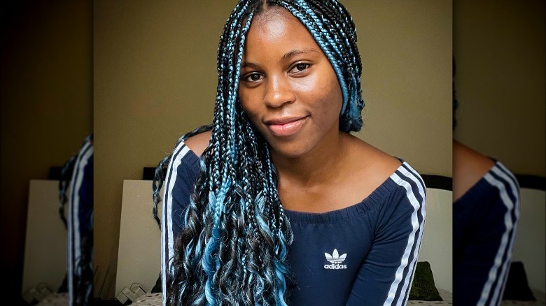 A woman with colorful braids