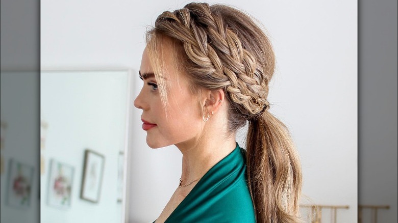 A woman with a double braided ponytail