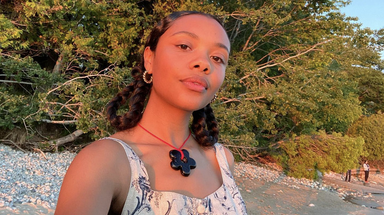 A woman with looped braids