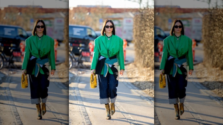 woman with sweater around waist