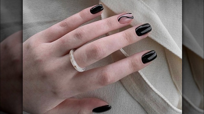 black swirl manicure