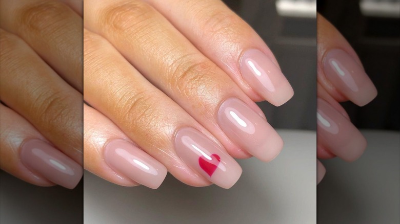 Woman with heart nails