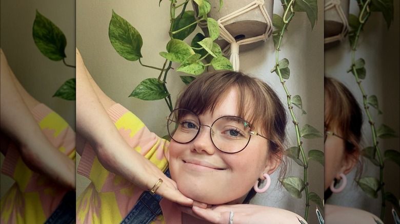 Girl wearing colorful hoops.