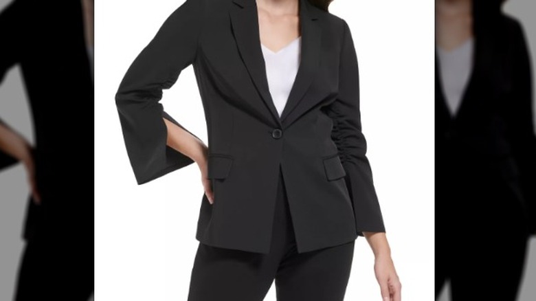 brunette woman black blazer