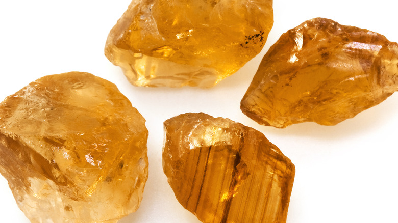 Four pieces of amber citrine