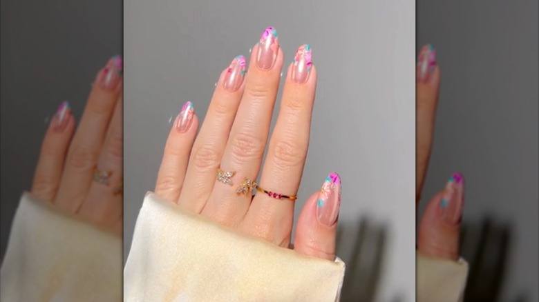 Floral pink glazed donut nails