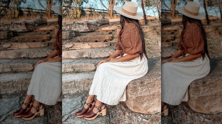 Brown leather clogs