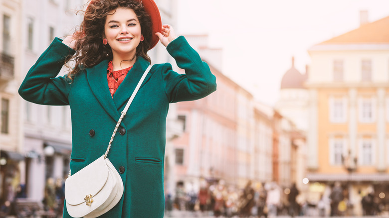 woman wearing cross-body bag