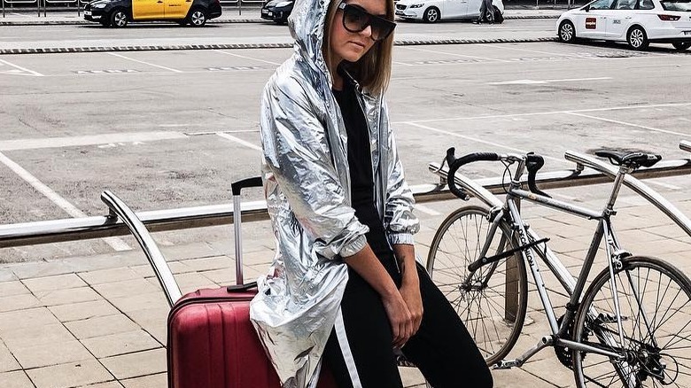 Woman wearing metallic jacket