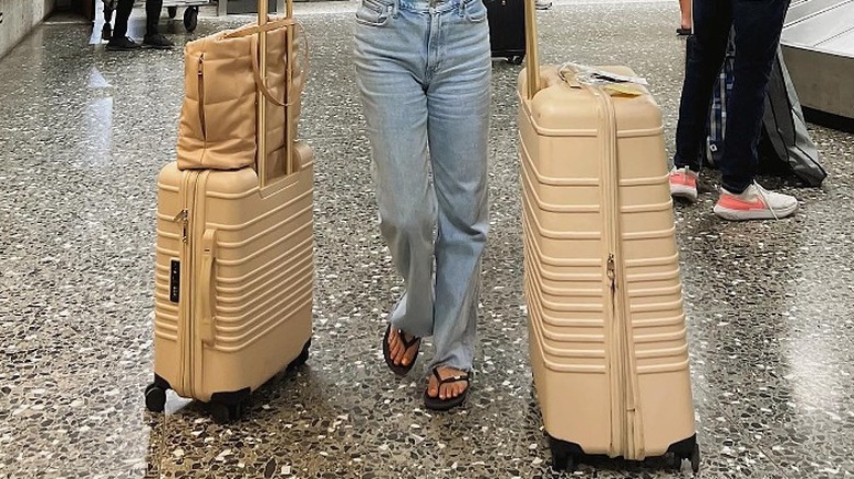 Woman wearing flip-flops in airport
