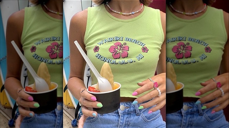 woman wearing waikiki beach tank