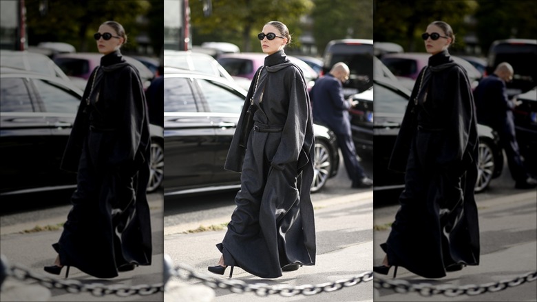 woman wearing belted cocoon coat