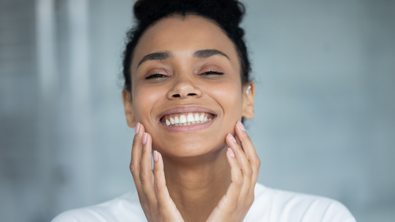 smiling woman with bright skin