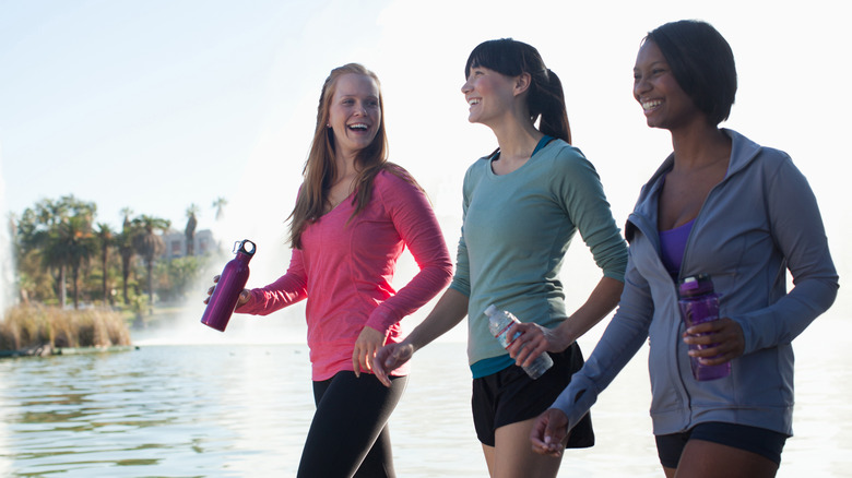 three woman walking