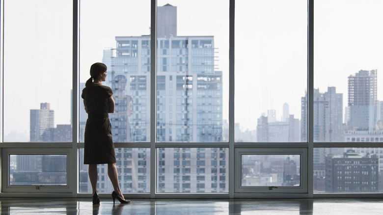 Powerful businesswoman in black dress