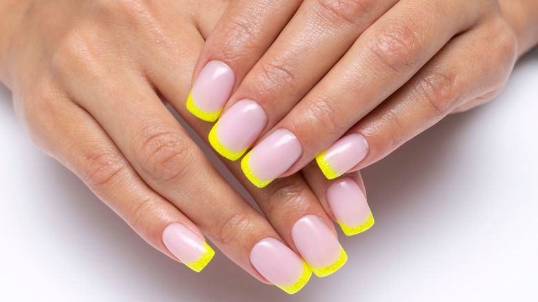 French manicure with neon yellow tips