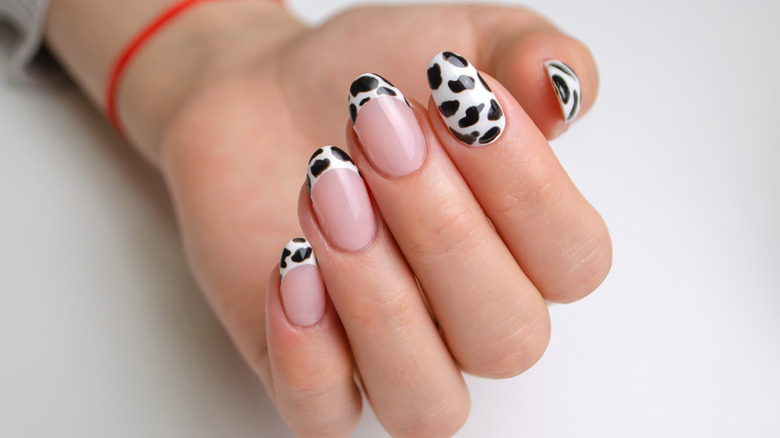 French manicure with cow pattern